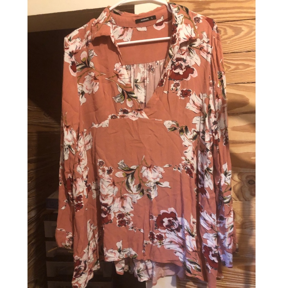 GUC. Slight high/low hem, collar and cuff sleeve.